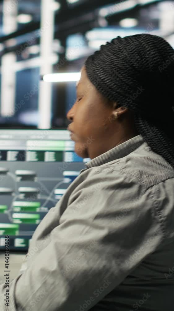 Poster vertical video data center employee deploying ai solutions optimizing equipment. server farm softwar