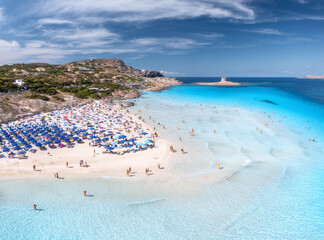 Aerial view of famous La Pelosa beach at sunny summer day. Stintino, Sardinia island, Italy. Top...