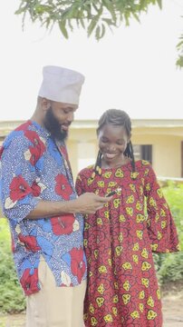 young man and daughter amazed using mobile technology