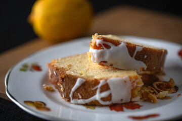 Fresh home made lemon drizzle cake on plate
