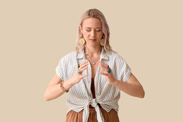 Meditating woman on beige background
