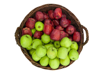Red and green apples in wicker basket