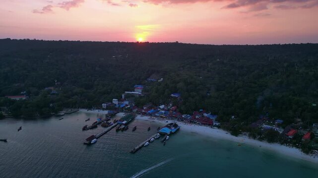 9.3.25 Koh Rong KHM, sunset island village. Perfect aerial view flight drone