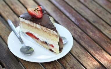 Delicious cake with strawberries and chocolate.
