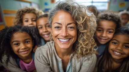 Smiling teacher surrounded by happy diverse children in a bright classroom, showing warmth and joy