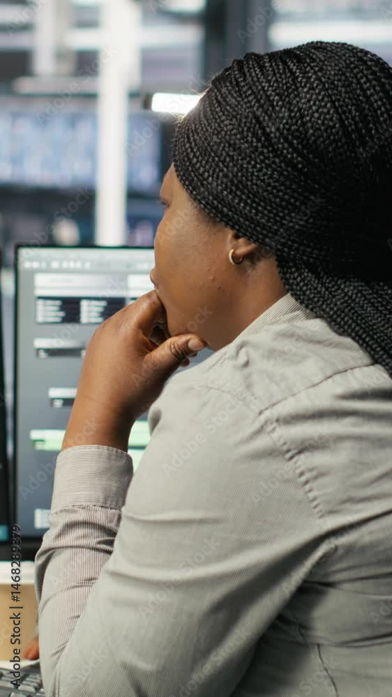 Poster vertical video data center staff member in office using ai deep learning algorithms to analyze datas