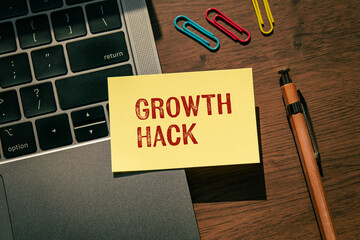 There is sticky note with the word Growth Hack. It is as an eye-catching image.