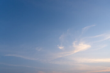 Front view and full frame of beautiful morning or evening blue and orange sky with cloudy while sunsets or sunrises taken at the sea used as natural blackground texture