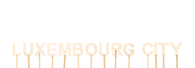 Luxembourg City, capital of Luxembourg, written in wooden letters on white background, ideal for institutional or cultural content