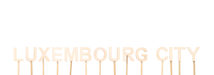 Luxembourg City, capital of Luxembourg, written in wooden letters on white background, ideal for institutional or cultural content