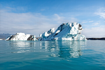 Blue glacier ice floating in Jokulsarlon lagoon, Iceland.