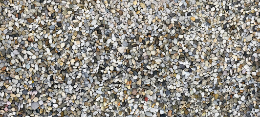 Colorful small pebbles and gravel stones seamless texture