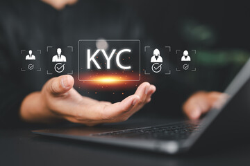 KYC, know your customer with business verifying the identity. Increase financial security and access personal financial data. Businessman showing KYC icon on virtual screen.
