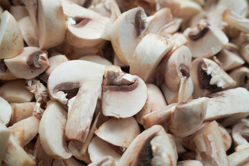  marinated raw mushroom pieces uncooked close up