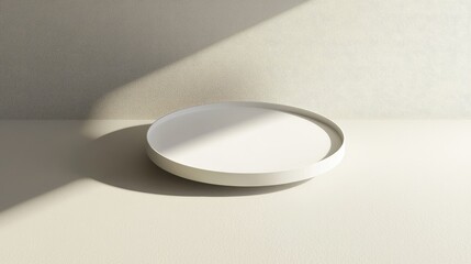 Empty white round tray against a neutral backdrop.