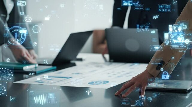会議するビジネスパーソンのグループとデジタルテクノロジーのコンセプト
