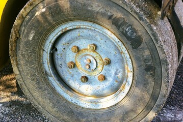old rusty wheel tyre of a truck