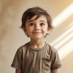 A smiling blond boy's cute little face shows the joy of childhood