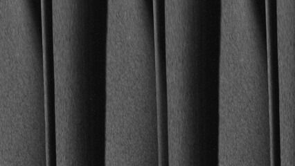 Fototapeta premium Metallic black and white pleat pattern with subtle sheen and soft texture like glossy satin pleats.