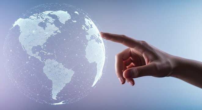 Hand touches a glowing digital globe representing global connection or technology.