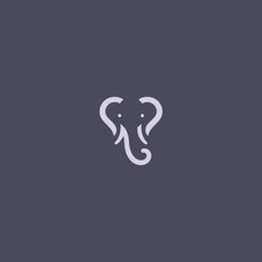 Elephant logo with a heart symbol in creative composition.