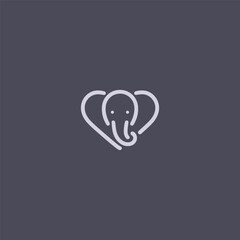 Elephant logo with a heart symbol in creative composition.