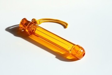 Transparent orange item with unique design.