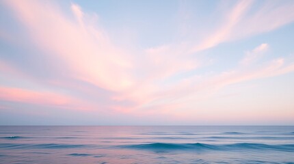 Fototapeta premium Ocean Sunset: Serene Sky, Azure Waves, Tranquil Beach