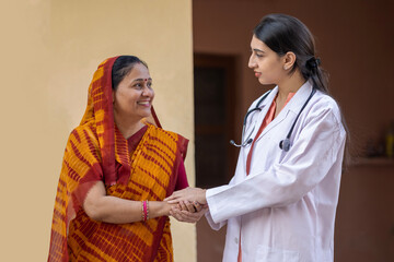 Concept of Indian rural women health in India. Indian female doctor consulting to unhealth rural woman. Rural India healthcare concept. Protection of cervical cancer in india