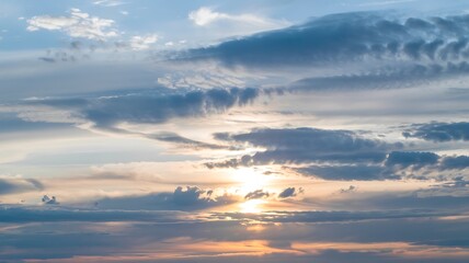 Beautiful Sky At Sunset With Layered Clouds And Golden Light