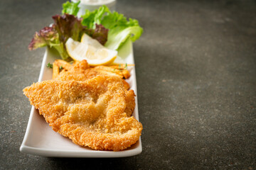 fish and chips - fried fish fillet with potatoes chips