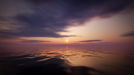 A beautiful sunset over the surface of the ocean.