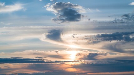 Obraz premium Golden Hour Sky With Dramatic Clouds And Sun Rays At Sunset