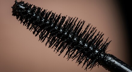 Close-up Macro Shot of Mascara Wand with Black Pigment