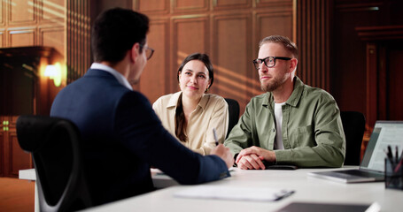 Trusted Family Divorce Lawyer Consulting Couple © Andrey Popov