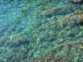 Sea beautiful tranquil clear water surface.