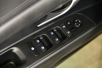 Obraz premium Button to control the side mirrors in the passenger car
