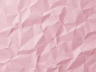 Fototapeta premium Crumpled pink paper texture. Pink wallpaper background 
