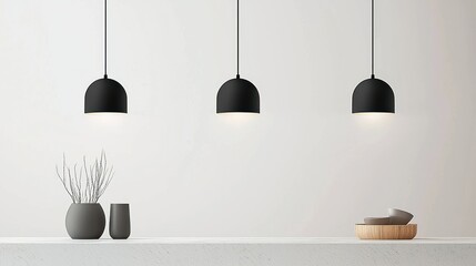 Three black pendant lamps hang in a minimalist room setting