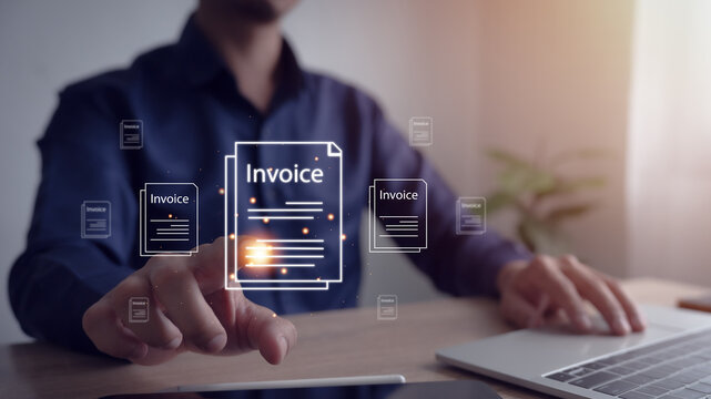 Electronic invoice and digital billing concept. Businessman using laptop to manage electronic statement on virtual screen.