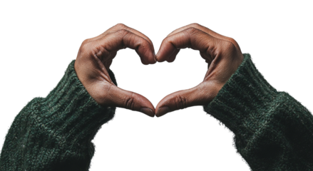Png of A pair of hands forming a heart shape, showcasing warmth and love, adorned in a cozy green sweater.