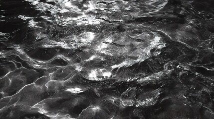 Obraz premium Grayscale Top Down View of Rippling Water Texture in Stillness