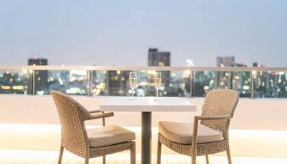 Fototapeta premium A rooftop terrace illuminated by galaxy lights, a table with champagne glasses on it with the city lights in the background