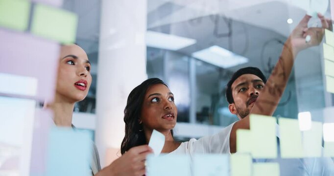 Business people, discussion and review with sticky notes for administration, meeting or strategy in office. Employees, training or planning with mentor for feedback, problem solving or upskill report