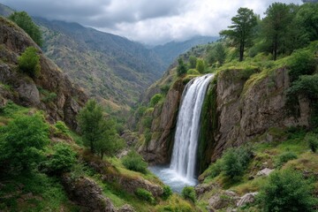 Majestic Waterfall Cascading Through Verdant Mountains: A Serene Landscape