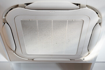 Close up air conditioning central system installed on the ceiling