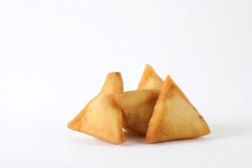Crispy fried tofu triangles on white background
