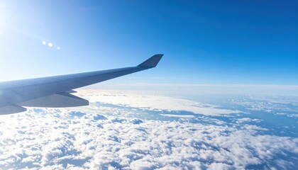 Obraz premium Aerial view of airplane wing over clouds sky above travel photography serene environment captivating perspective