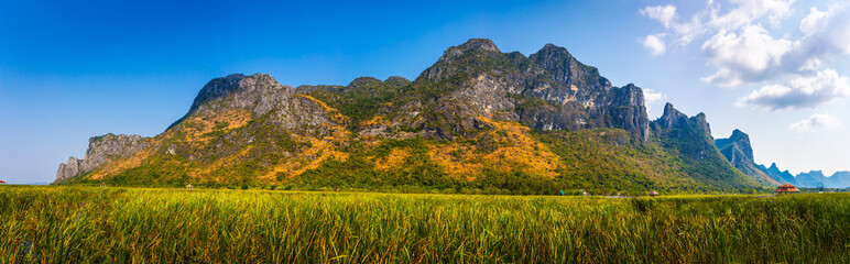 Beautiful Panorama landscape of mountain with grass field and blue sky range background in Khao Sam Roi Yot National Park, Kui Buri District, Prachuap Khiri Khan, Thailand