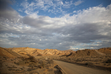 Gravel road cutting through the rugged Richtersveld landscape